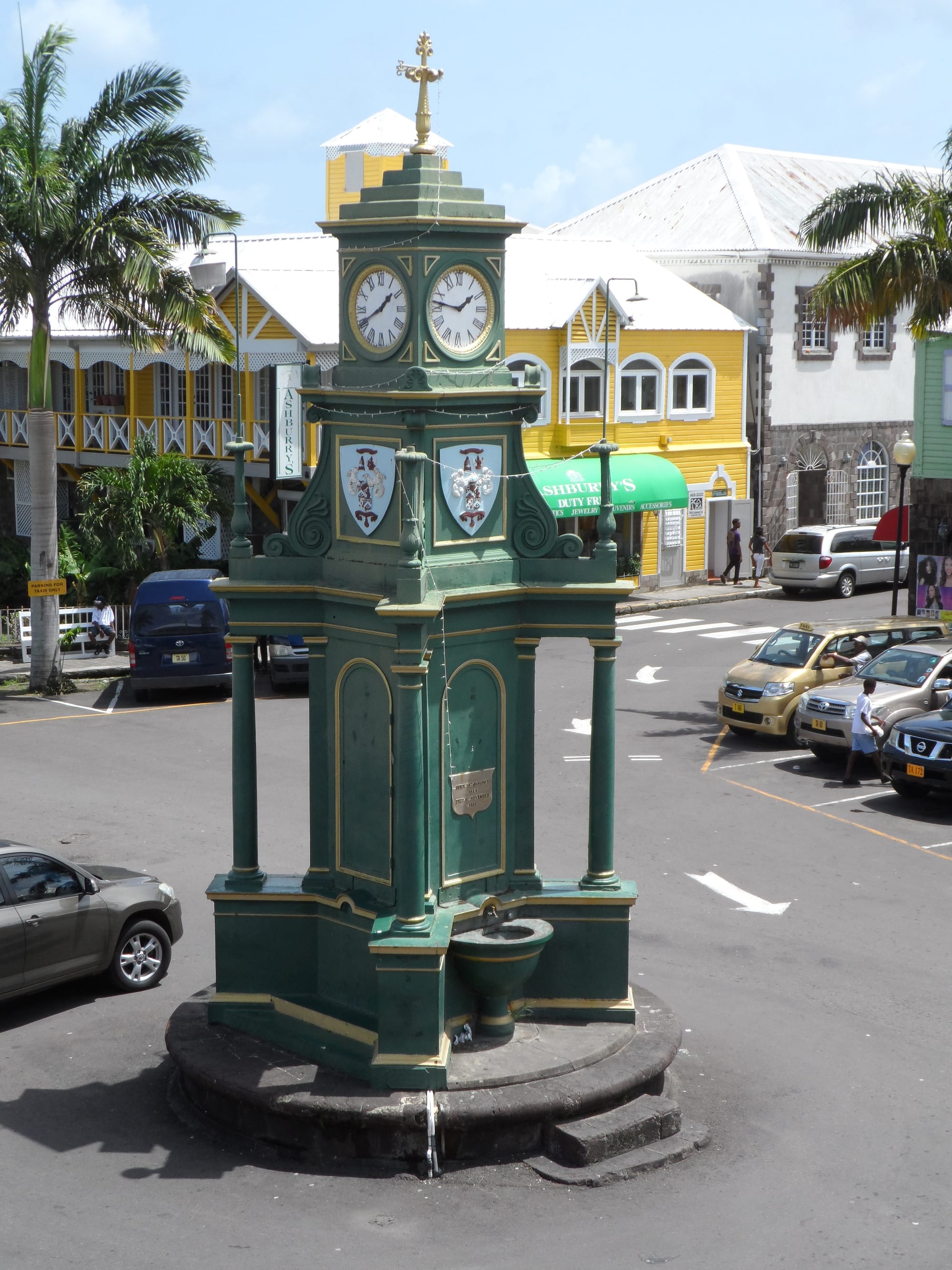 A colourful colonial-era town centre with a clock tower
