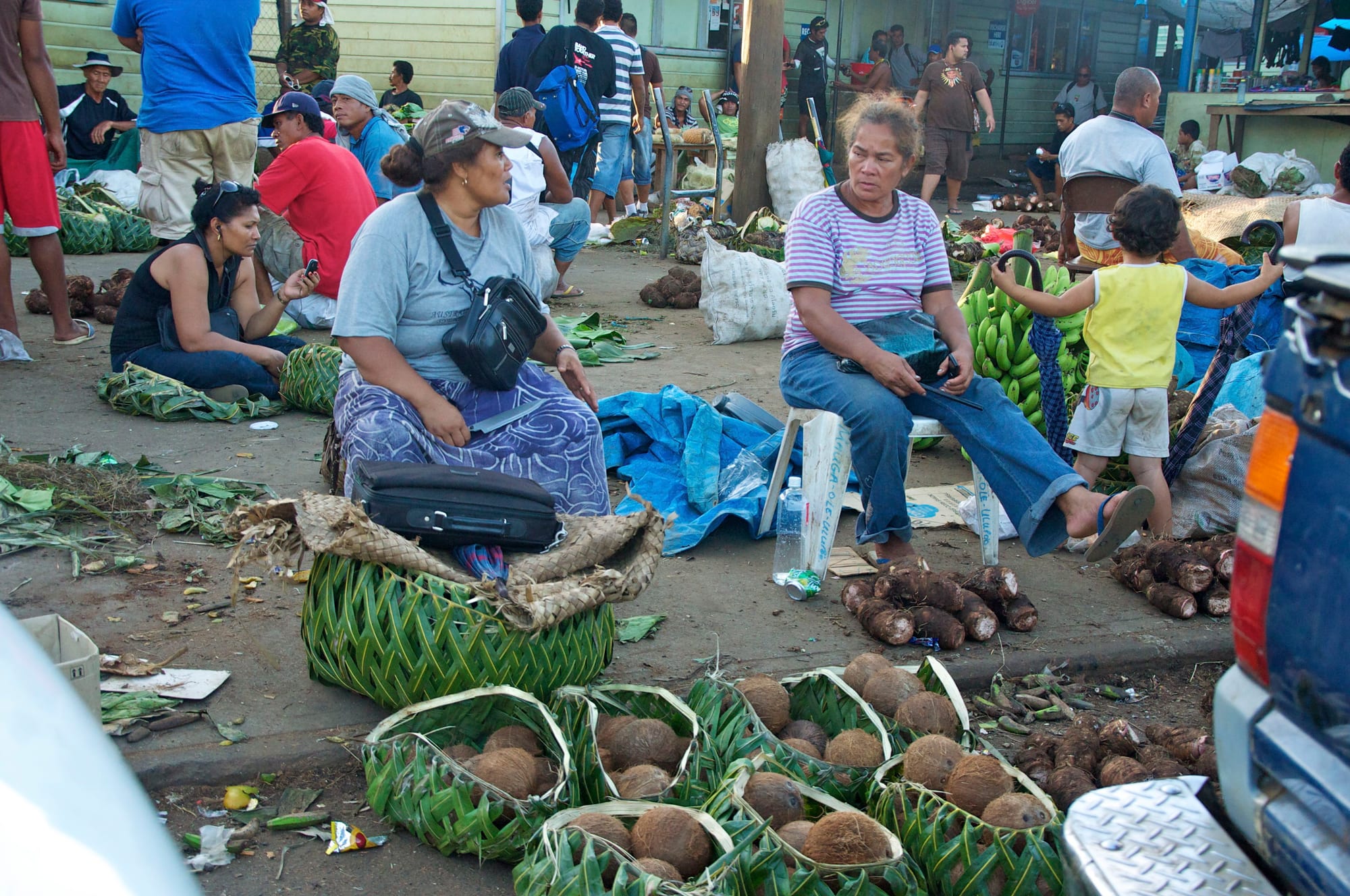 A market stall with root vegetables for sale