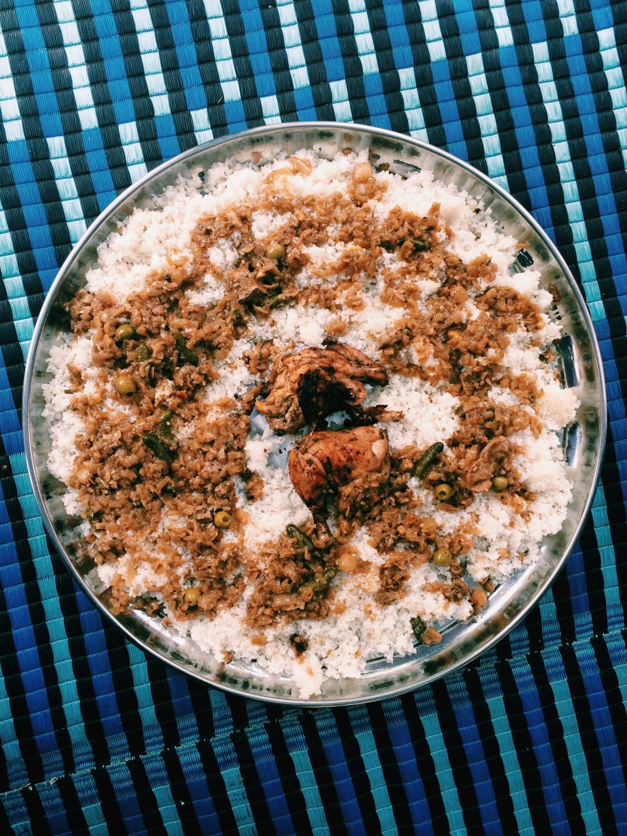 Chicken in an onion sauce served with rice