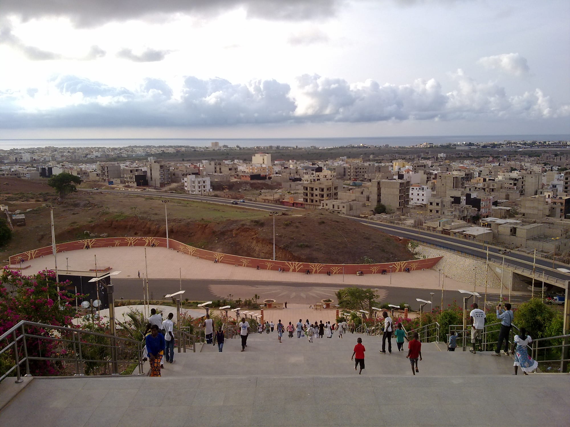 The colossal bronze African Renaissance Monument in Dakar, showing a man, woman and child striding upward