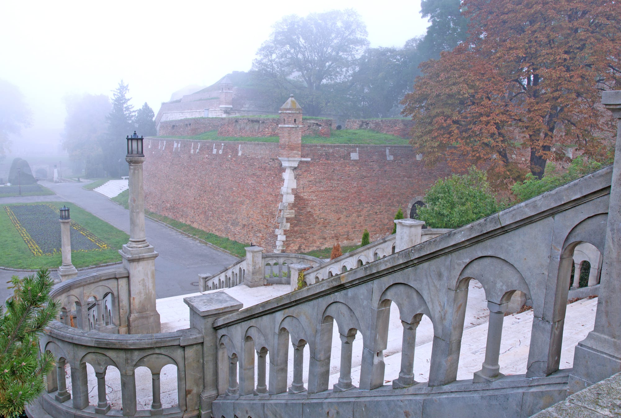 A large stone fortress complex overlooking the confluence of two rivers