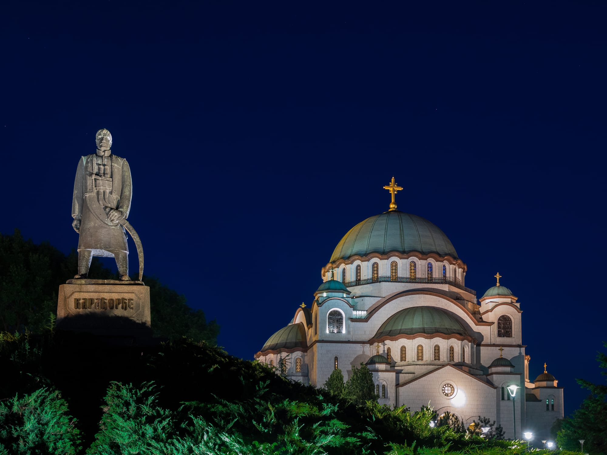 A massive white domed Orthodox church rising above the city