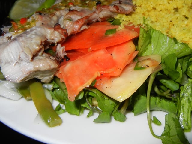 A Creole buffet plate with fish, rice and vegetables
