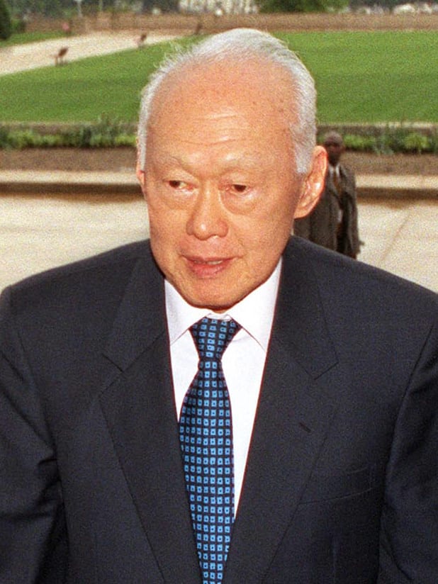 A formal portrait of a younger Lee Kuan Yew in a suit