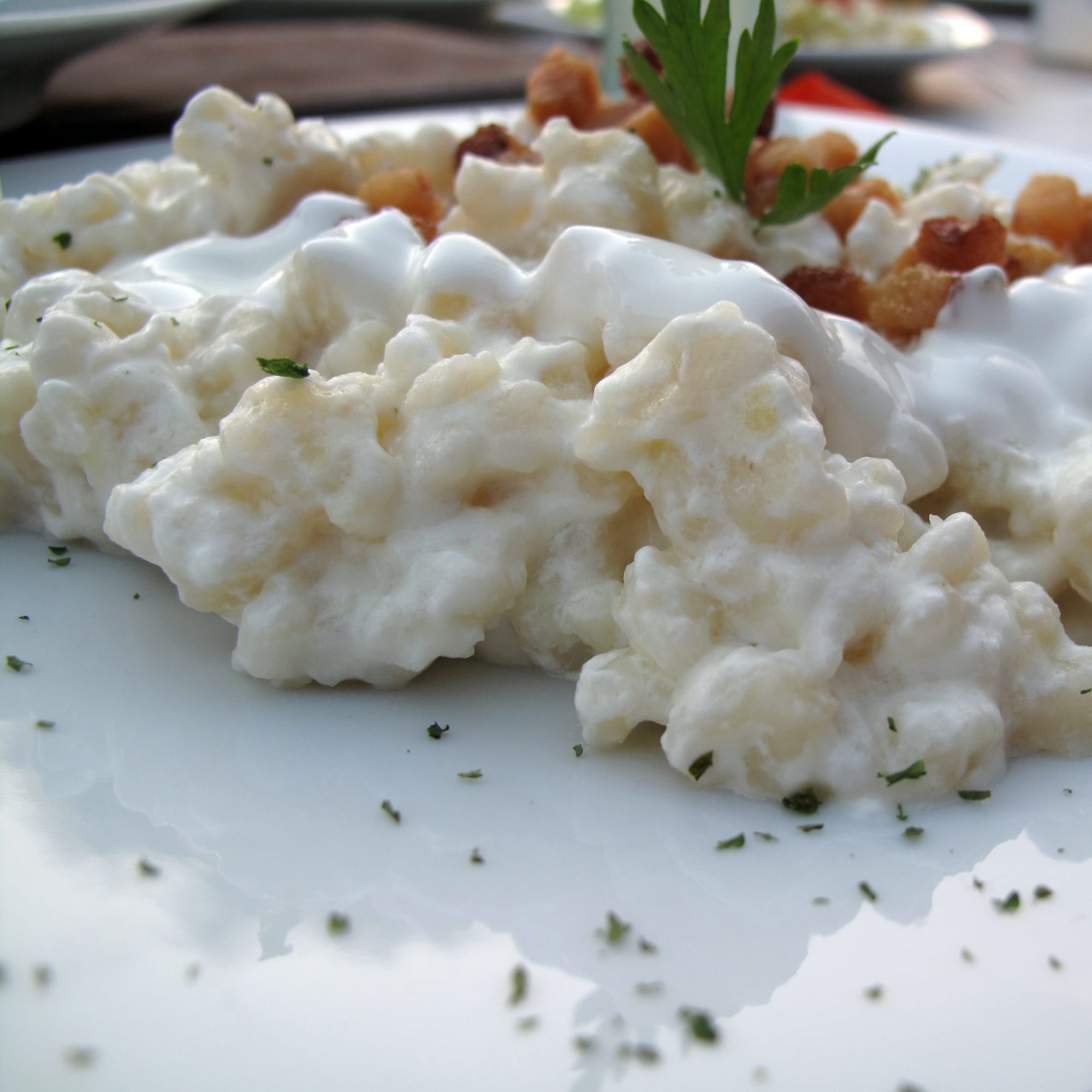 Small potato dumplings mixed with cheese and bacon bits