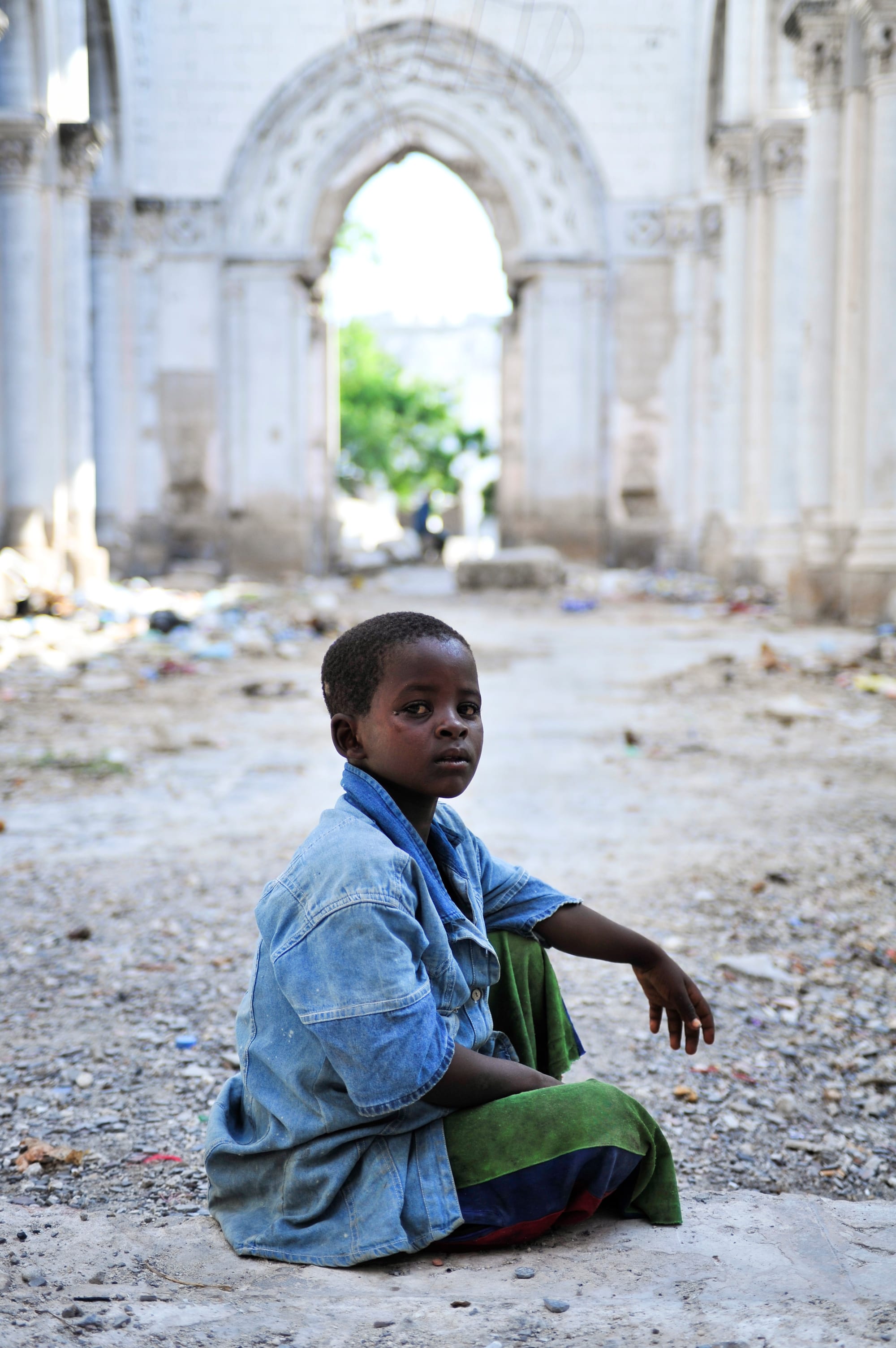The roofless, bullet-scarred stone shell of Mogadishu's Catholic cathedral against a blue sky