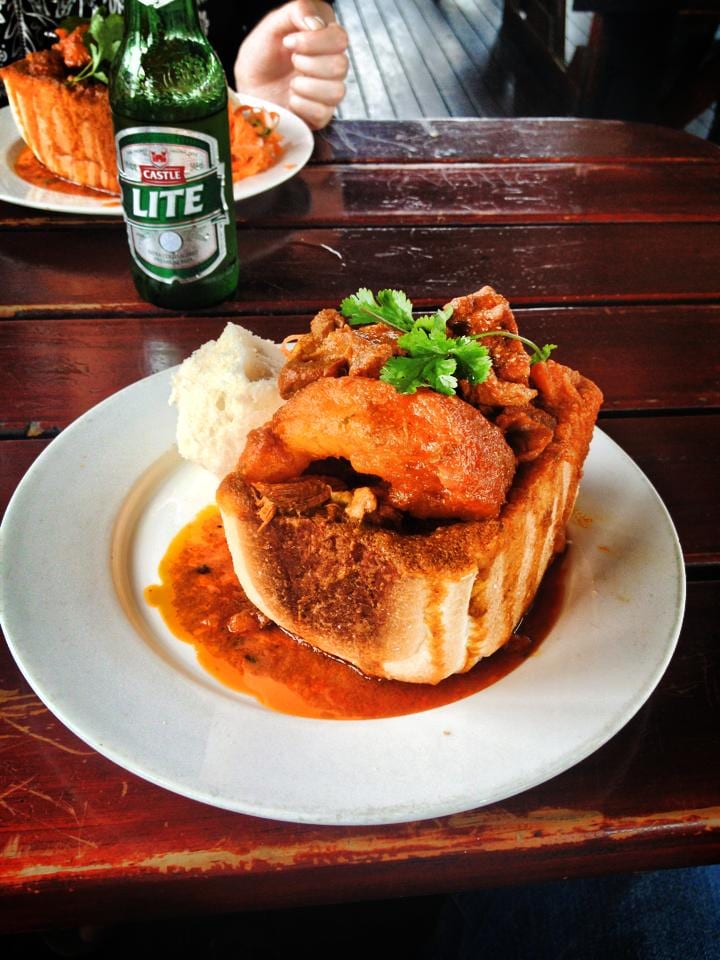 A hollowed bread loaf filled with curry