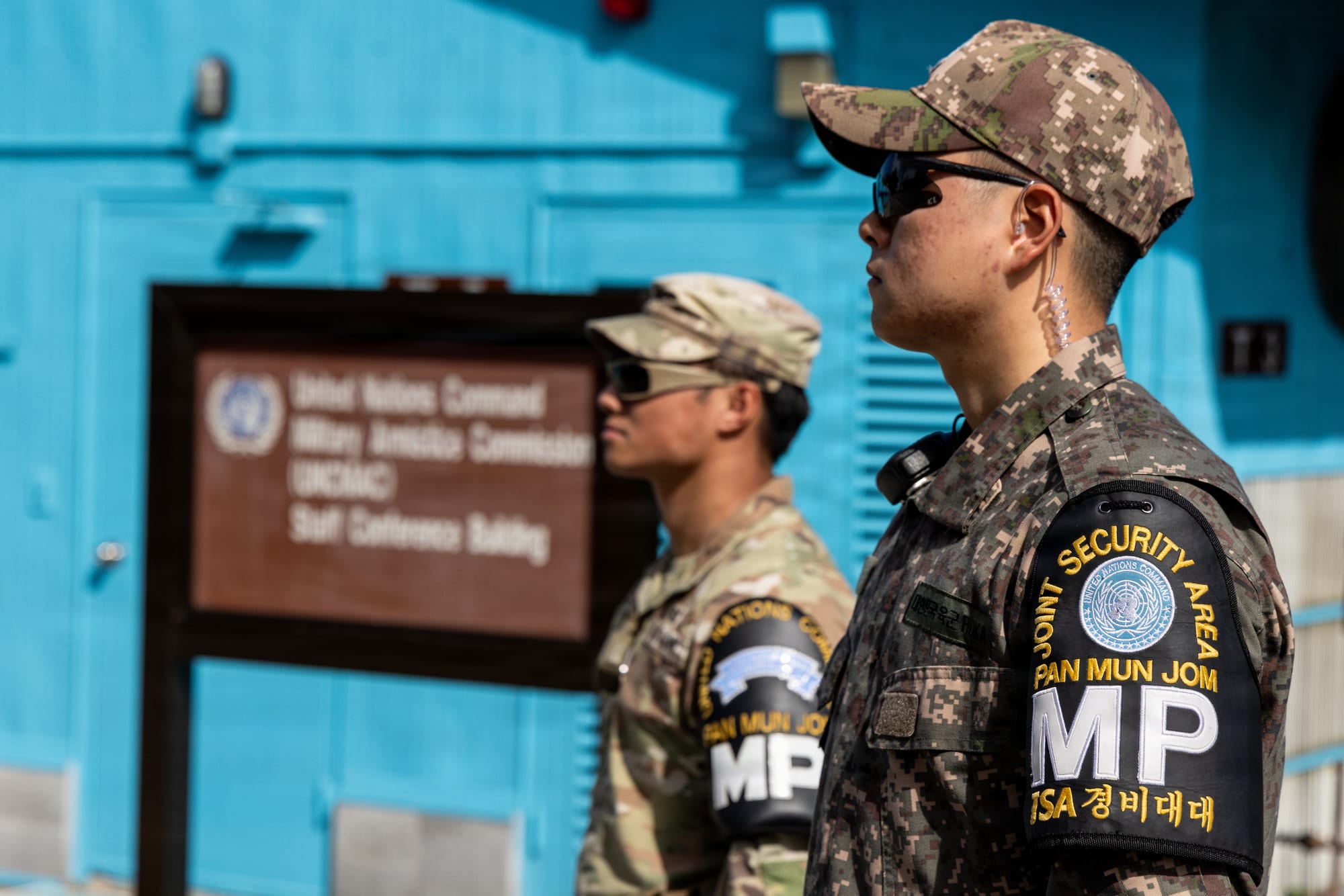 Soldiers standing guard at a heavily fortified border crossing