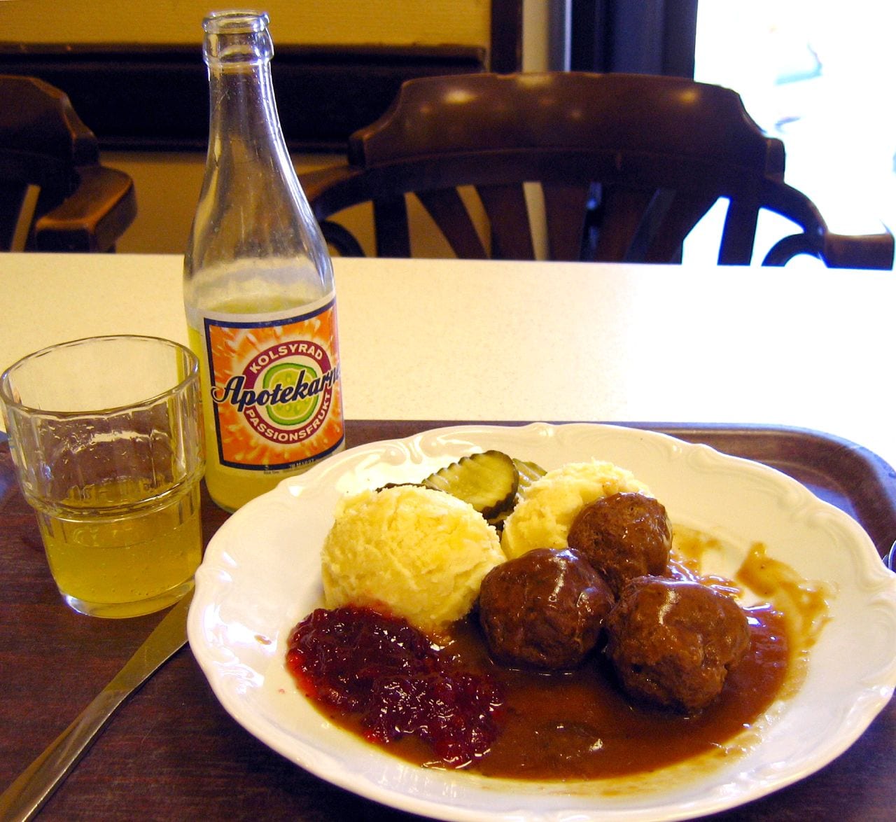 Small meatballs served with lingonberry jam
