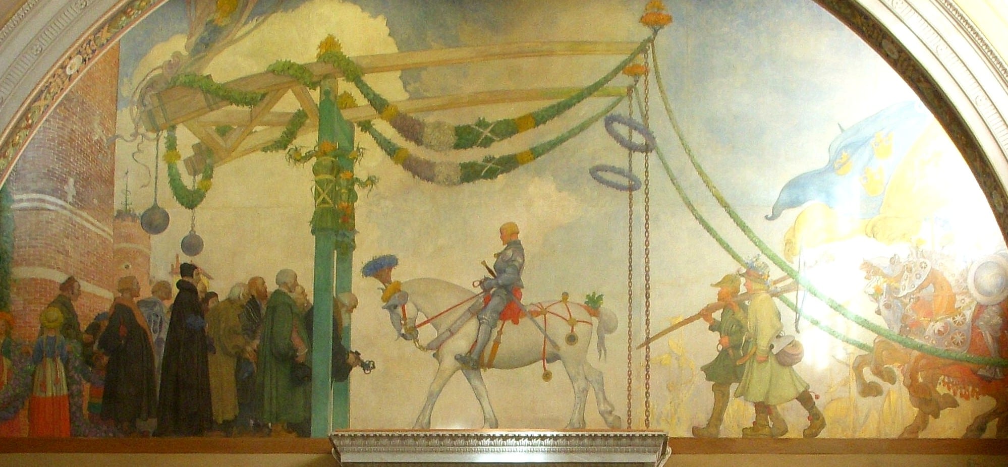 A wide mural of an armoured rider on a white horse passing under garlanded poles, watched by a crowd in dark robes, with soldiers and a blue-and-yellow banner behind him