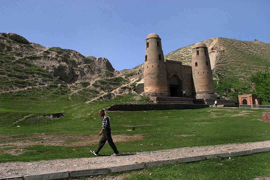 Reconstructed fortress walls and gates on a hillside
