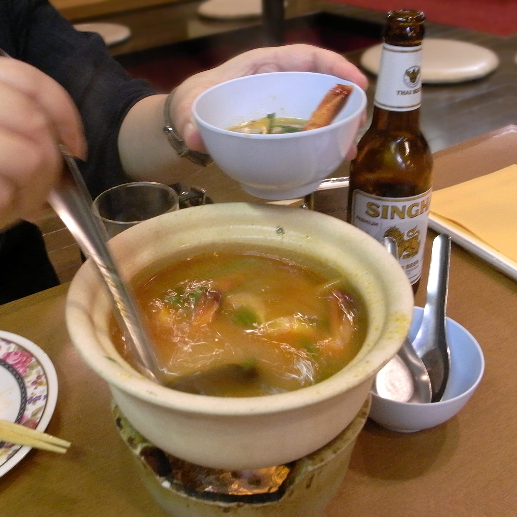 A bowl of spicy shrimp soup