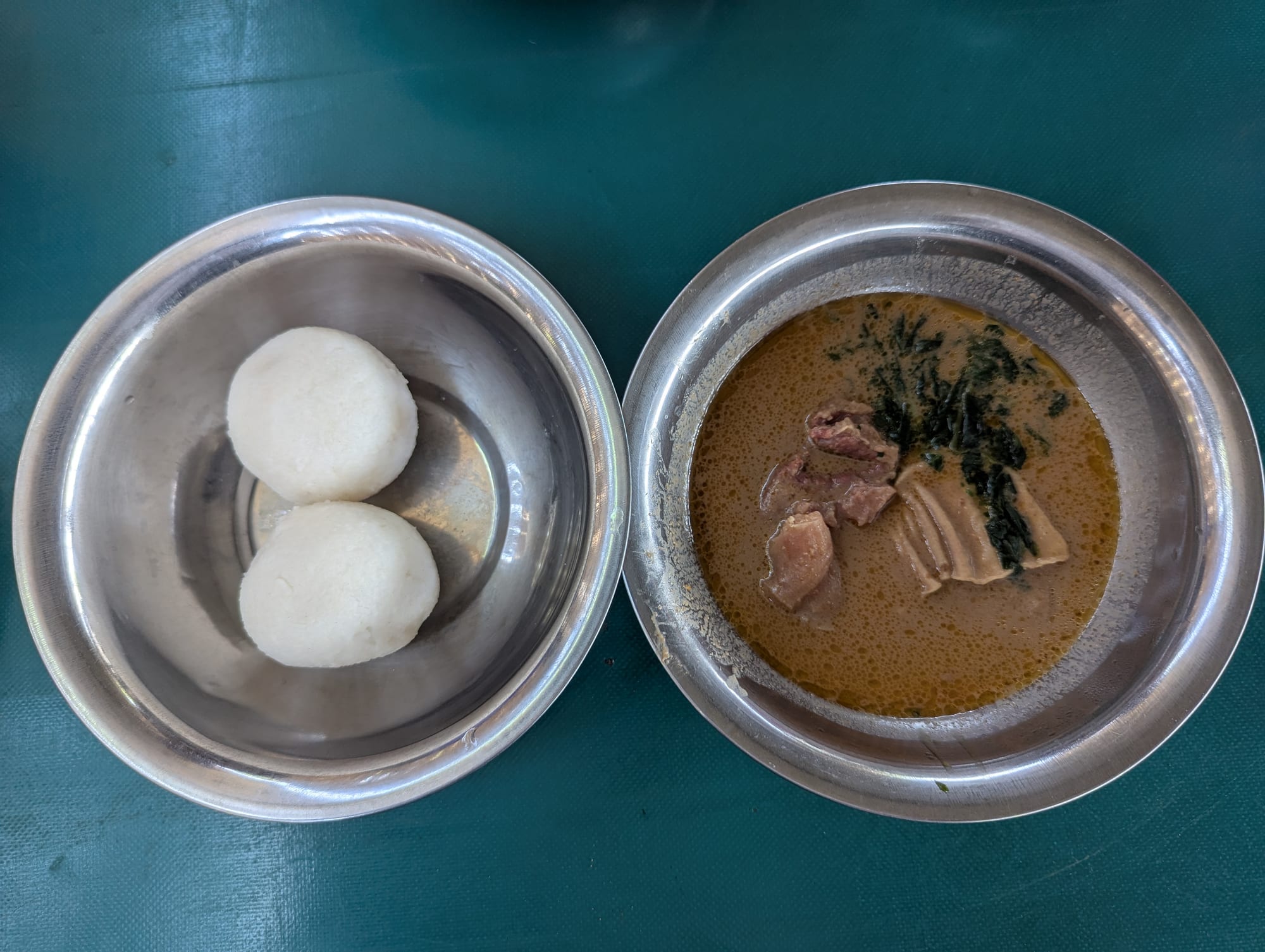 A pale, smooth paste served with a peanut-based sauce