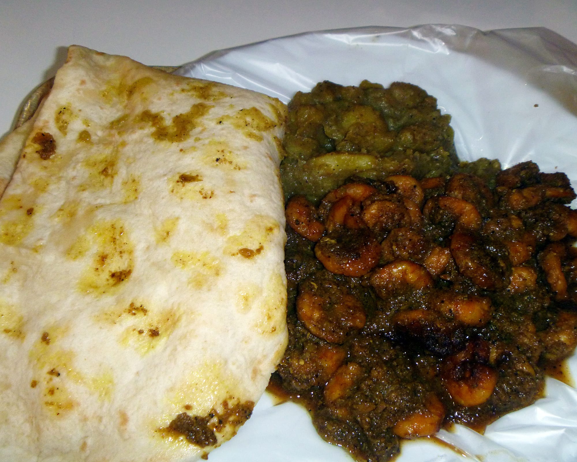 A curry meal served with flatbread