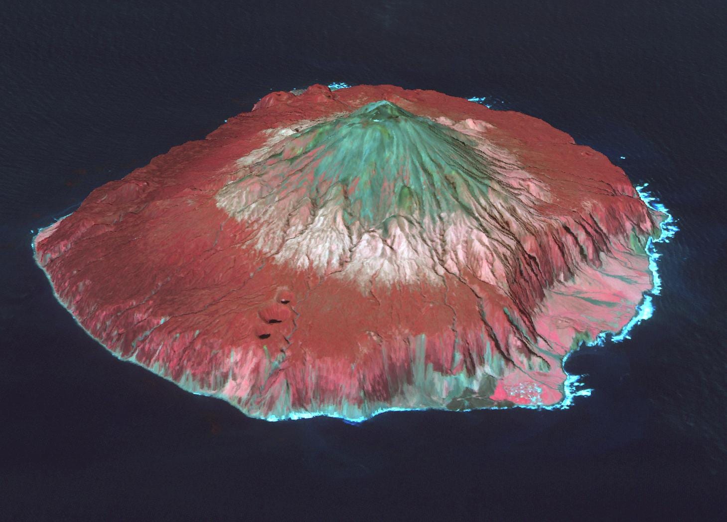 A satellite image of the near-circular volcanic island of Tristan da Cunha ringed by cloud