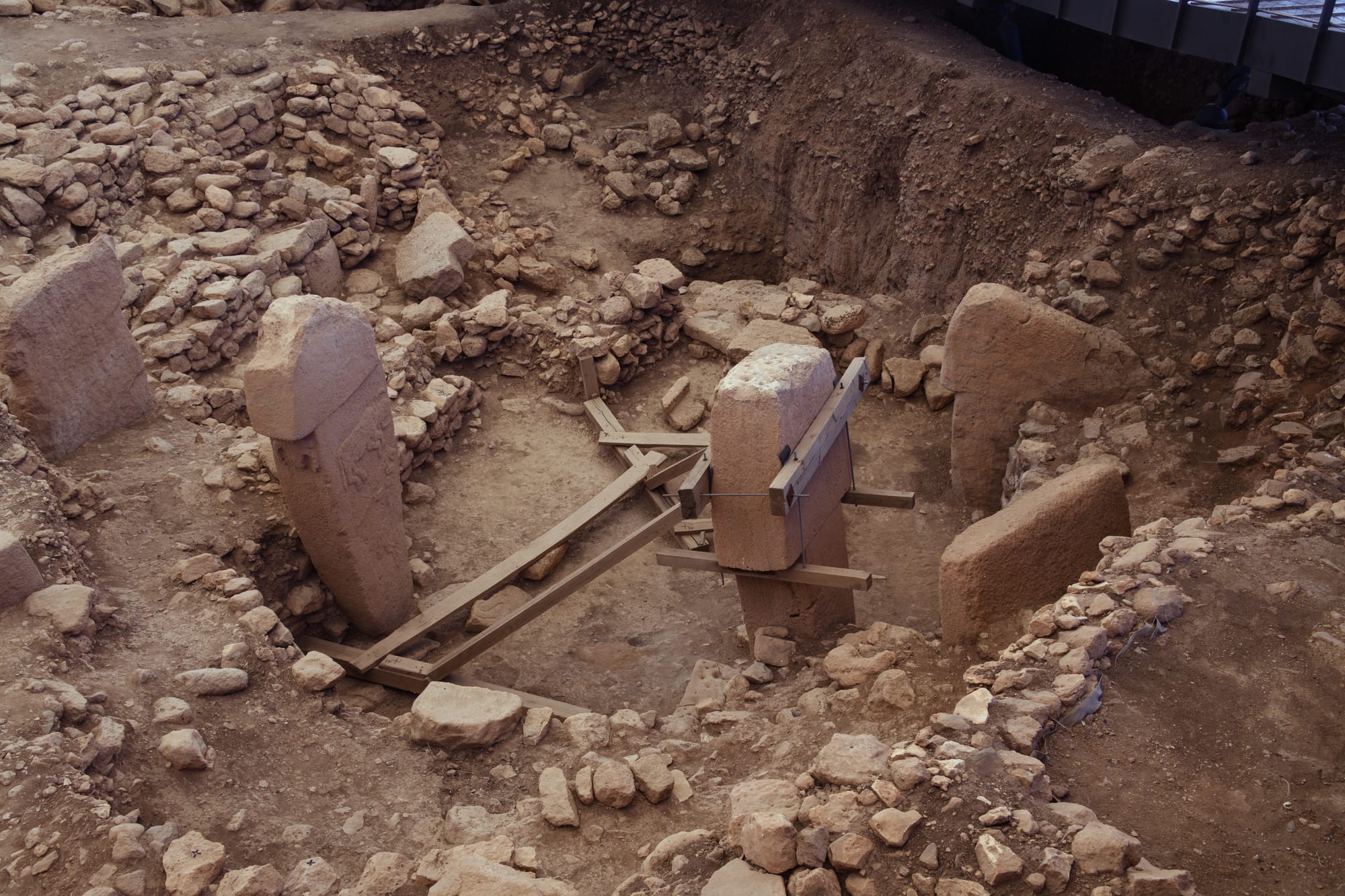 Massive T-shaped stone pillars excavated in a circular arrangement