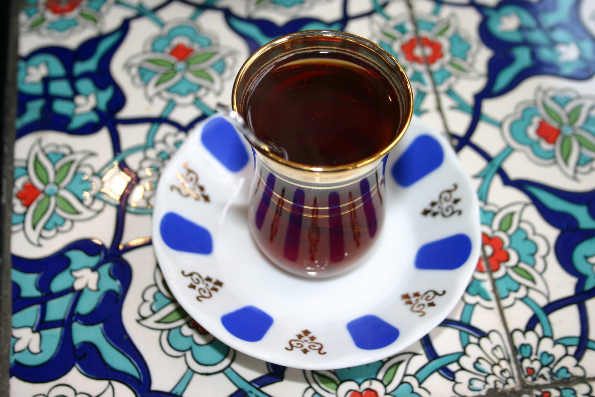Tea served in a small tulip-shaped glass