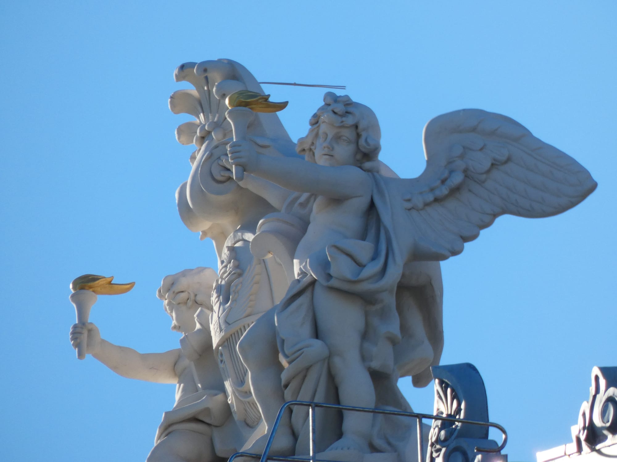 Ornate sculptural detail on a grand opera house facade