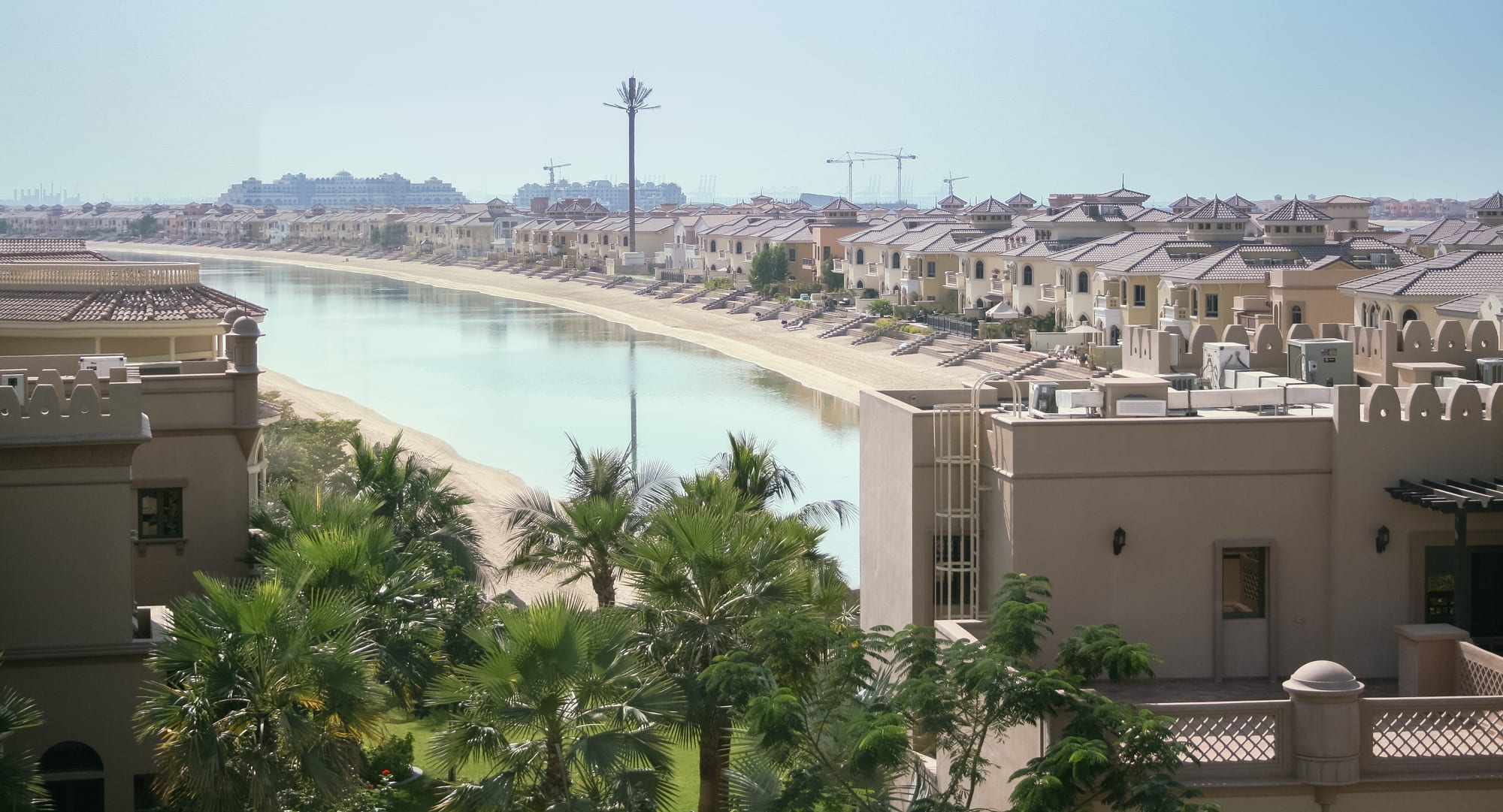 An artificial island shaped like a palm tree extending into the sea