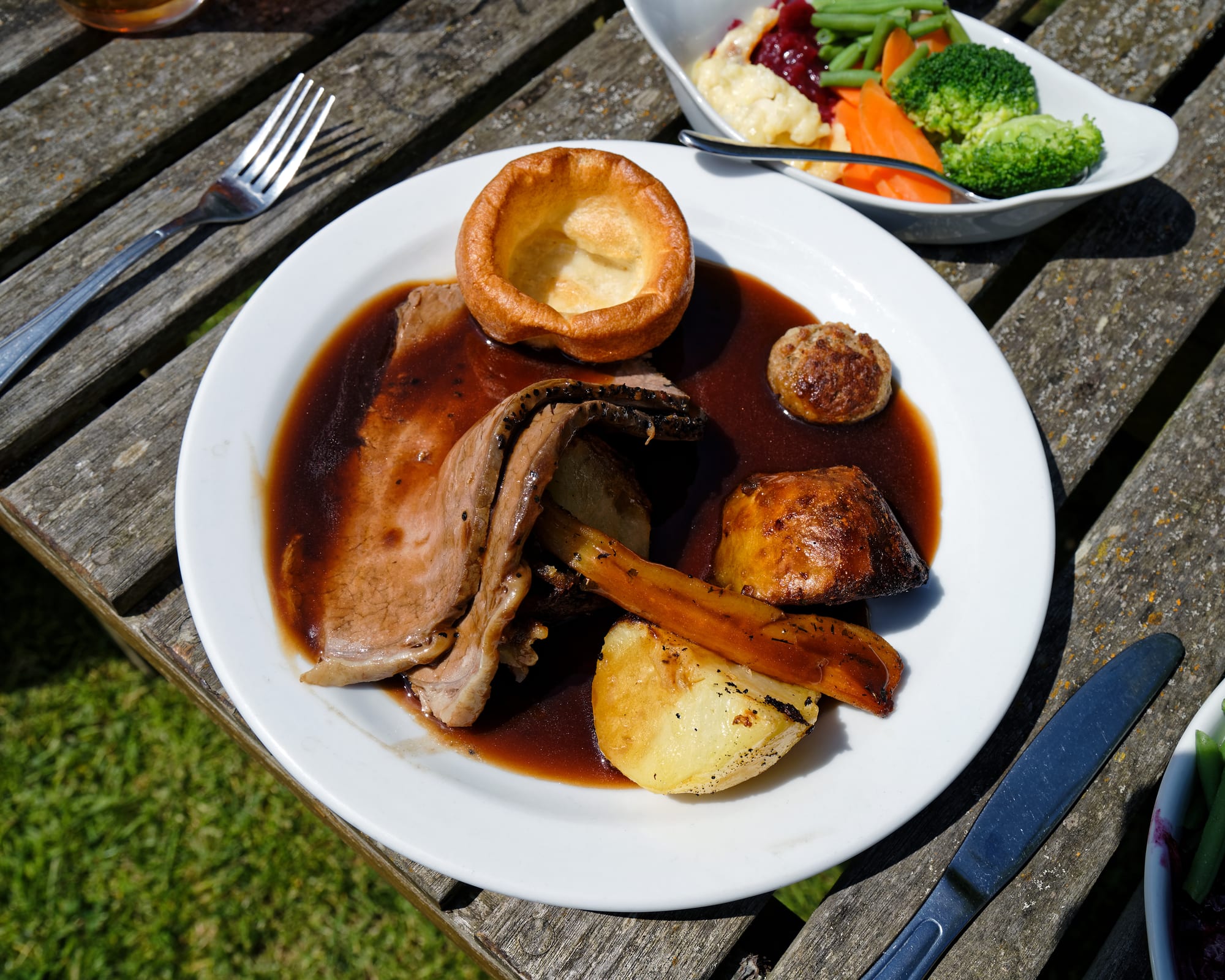 Roast beef with potatoes, Yorkshire pudding and vegetables
