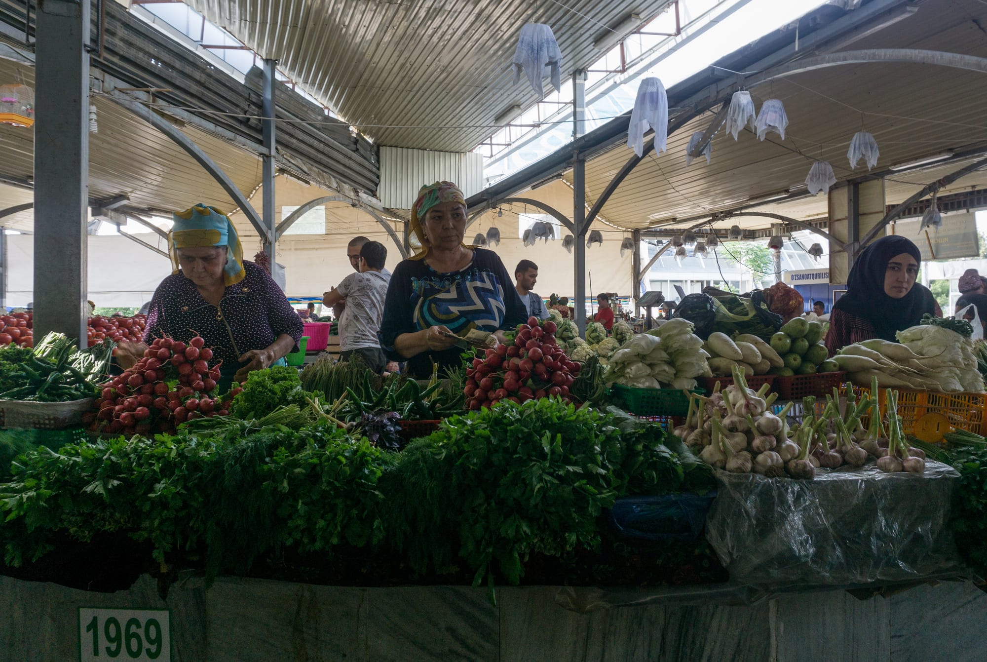 A large domed market building with vendors