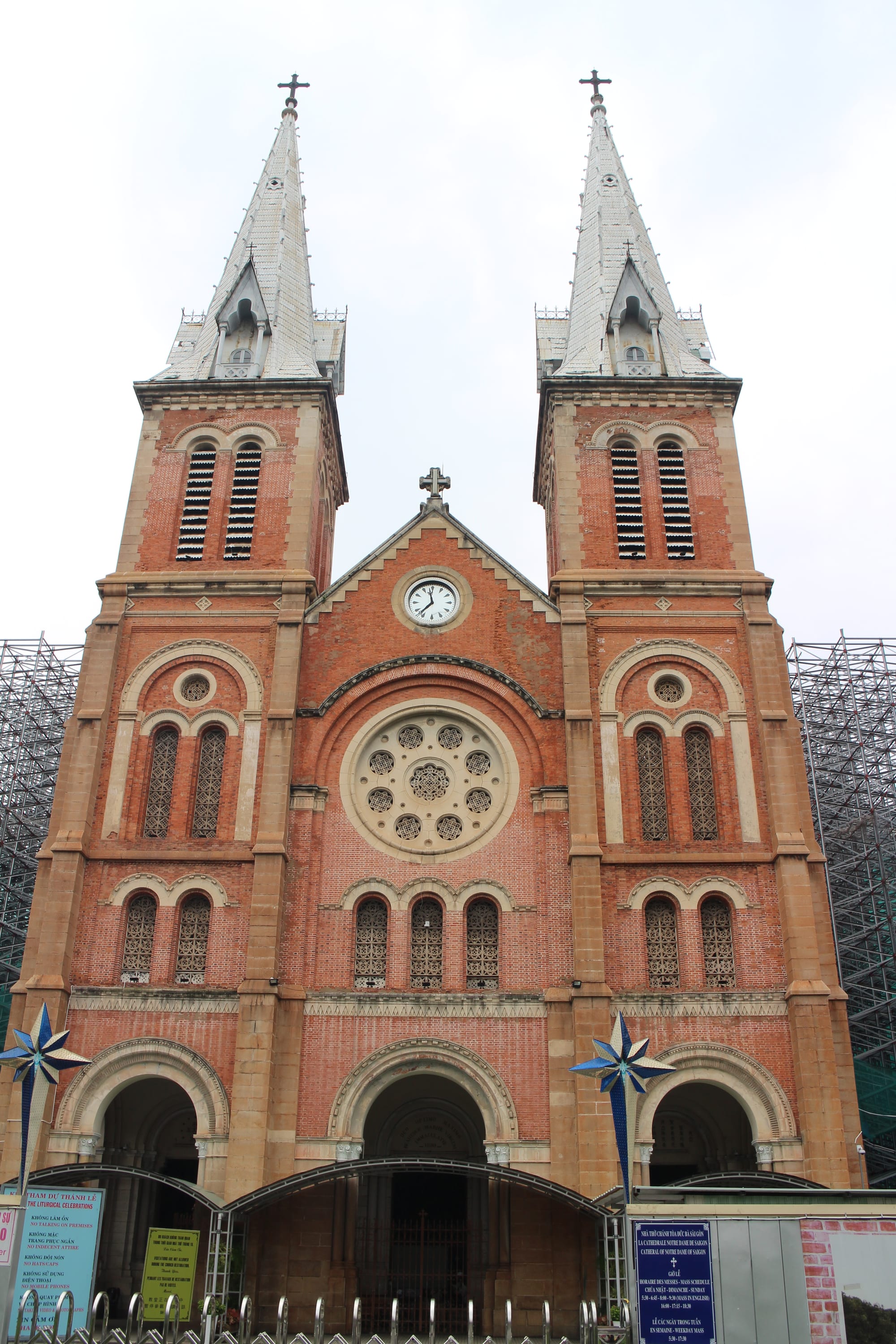 A red-brick colonial-era cathedral facade