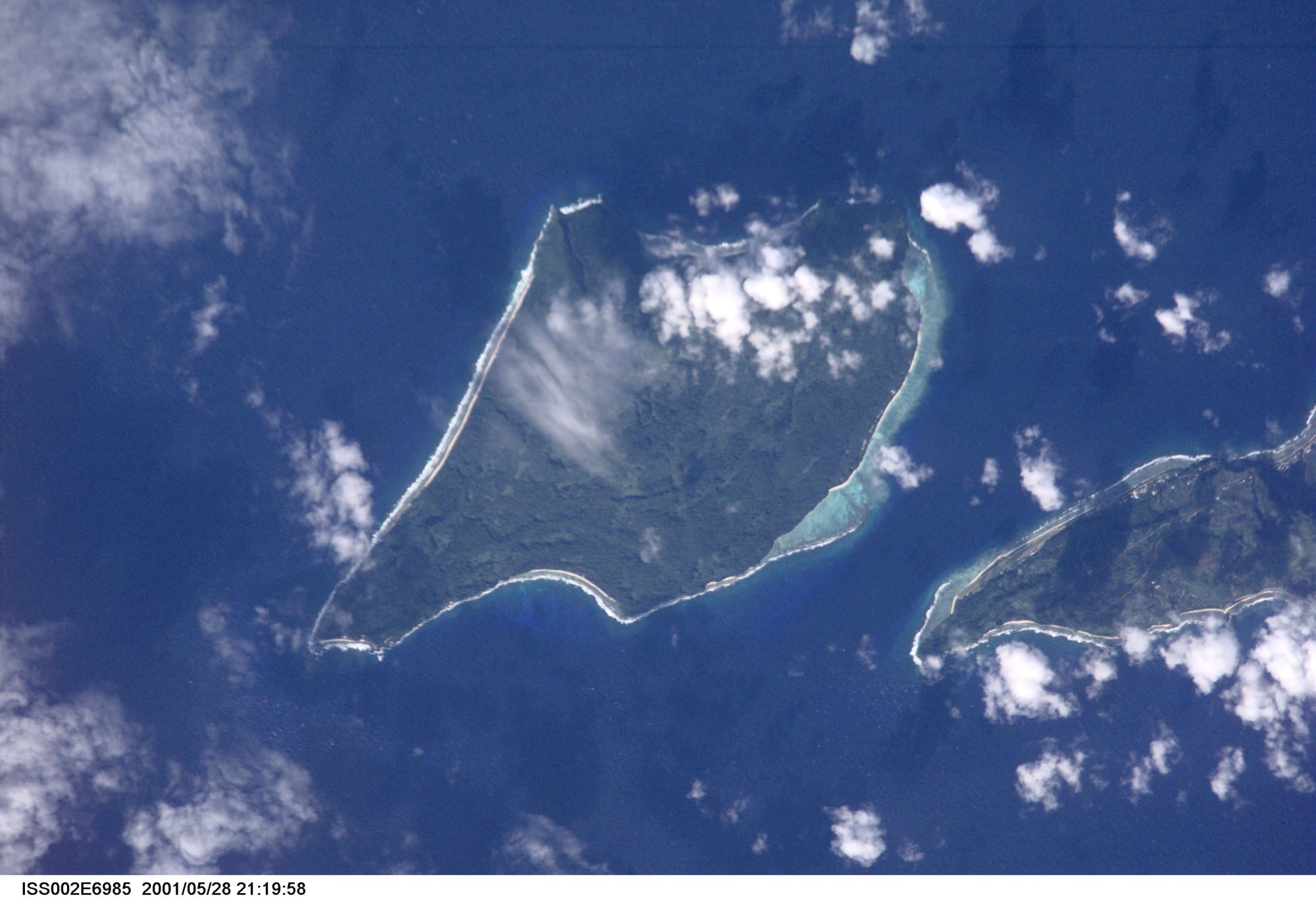 A satellite view of a small mountainous island in the Pacific
