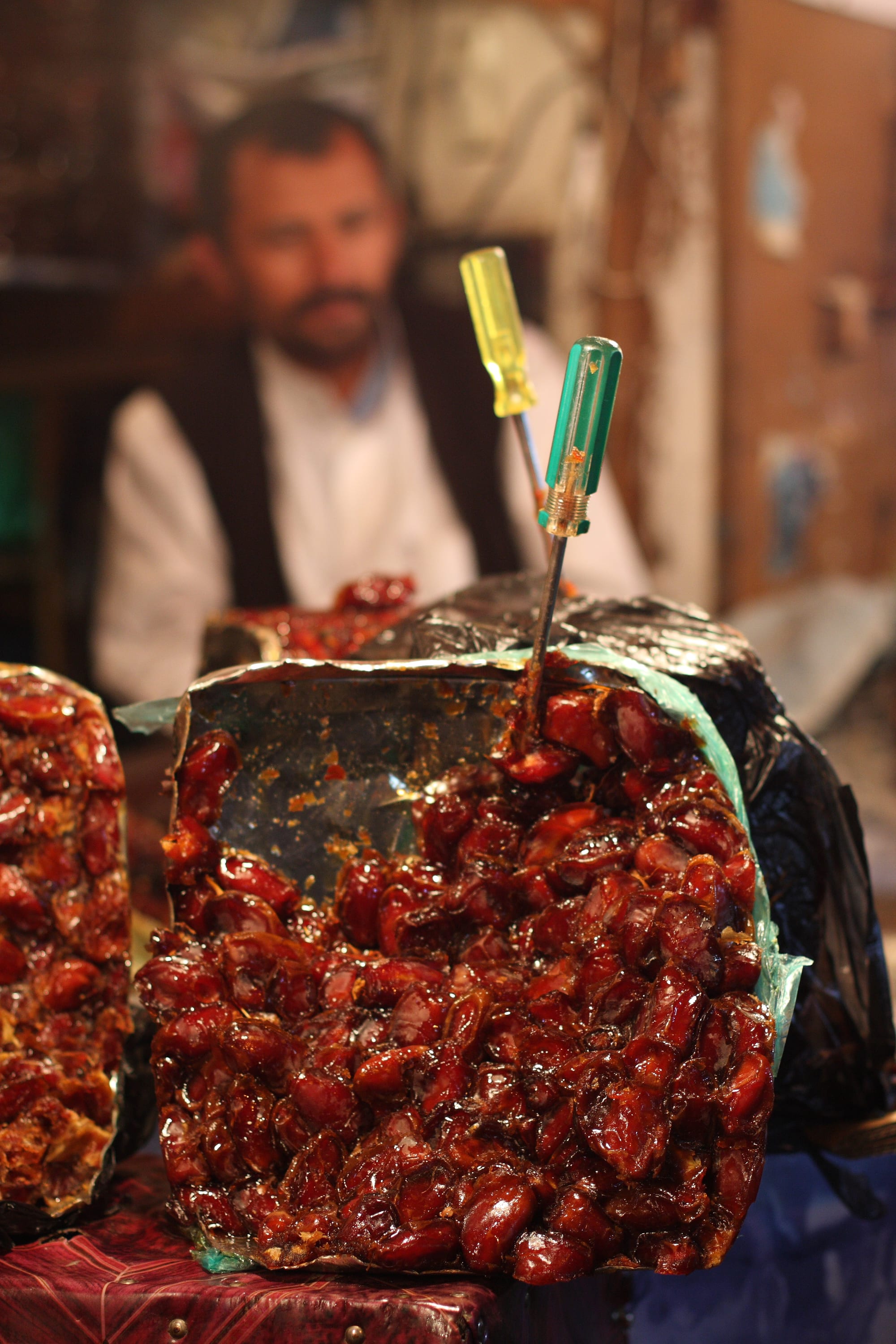 A traditional market with vendors and produce